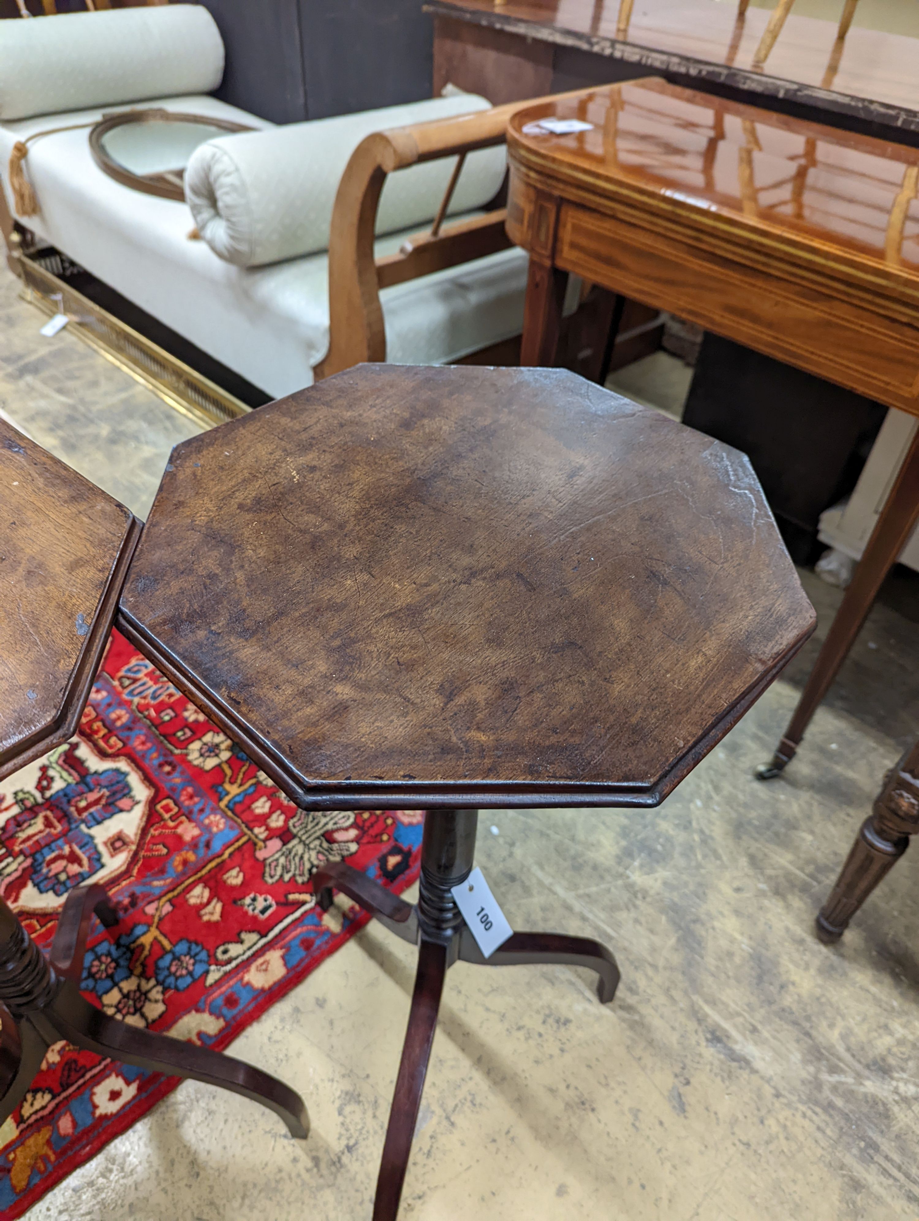 A pair of Regency style mahogany octagonal tripod wine tables, width 38cm, height 77cm